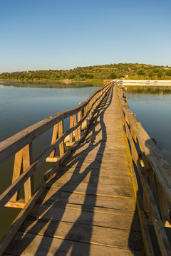 Wooden ruined bridge leading to the island of Zvernec with Monastery of Saint Mary.The bridge is located on the Narta Lagoon.
