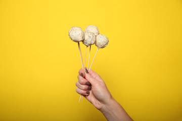 Cake pop candy, sweet dessert on stick.