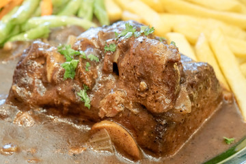 Stewed beef steak with selected focus