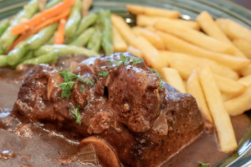 Stewed beef steak with selected focus