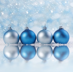 Christmas background with xmas balls and reflection.