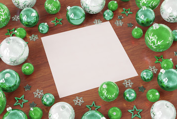 Christmas card mockup with green baubles 3D rendering