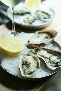 Fresh oysters served with lemon