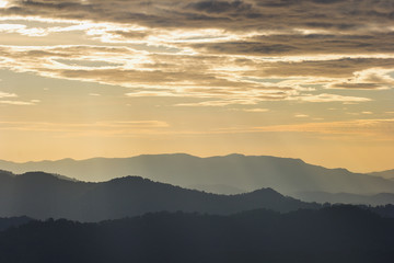 Mountain soft fog scenic sunset morning at thongphaphum, kanchanaburi, thailand Mountain hill viewpoint scenic landmark .