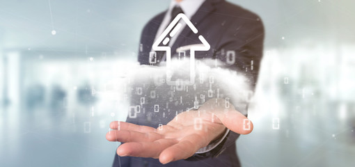 Businessman holding a Binary cloud with upload internet arrow 3d rendering
