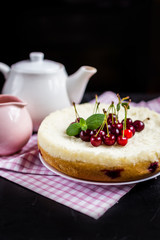Cherry pie on black background