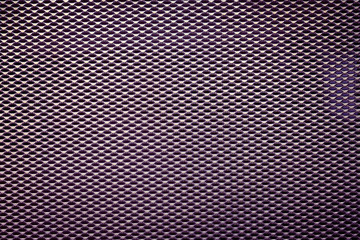 perforation of sheet metal background. Industrial texture