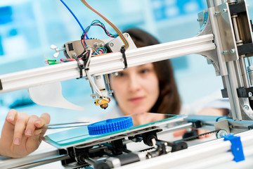 Female College Student Printing 3D Object