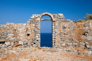 The historic walls of the museum on the island of Spinalonga. Kalydon in the Gulf of Elounda in Crete. The lepers' island. Historic ruins and homes of lepers.