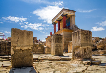 Red columns of the Knossos palace. Fragment of the ruins of the Knossos palace. Architecture on...