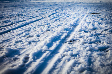 Fototapeta na wymiar snow road with ice danger street