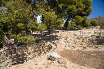 Red columns of the Knossos palace. Fragment of the ruins of the Knossos palace. Architecture on Crete, Greece.