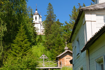 Chapel and cross at the burial place of the Holy Martyr Peter Zverev Archbishop of Voronezh in the Golgotha-Crucifix skete at Mount Calvary on Anzersky Island, Solovki Islands