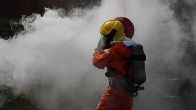 Fireman action in traning in  emergency situation in Slow motion