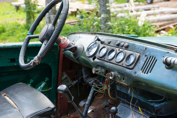 Fototapeta premium Monastic UAZ cars in the Golgotha-Crucifix skete at Mount Calvary on Anzersky Island, Solovki Islands, Arkhangelsk Region, Russia