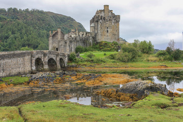 Reflections of a Scottish castle in the water.