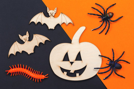 Do it yourself Halloween pumpkin and two vampire bats wooden cut outs with spiders< concept for Helloween craft with kids