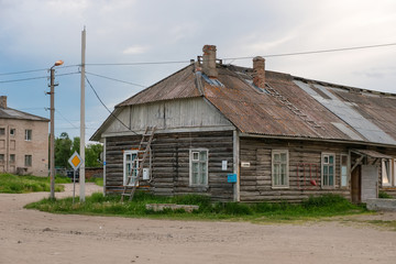 ISLAND SOLOVKI, RUSSIA - JUNE 26, 2018: Barak Solovetsky camp. Now residential house in the village...
