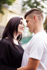 Fototapeta premium The girl and the guy look at each other for a walk