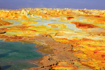 Fototapeta na wymiar Out-this-planet view to Dallol volcano crater at Danakil Depression and sulfur, salt, potassium, calcium and ferrum mineral fields in hottest place on Earth