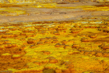 Out-this-planet view to Dallol volcano crater at Danakil Depression and sulfur, salt, potassium, calcium and ferrum mineral fields in hottest place on Earth