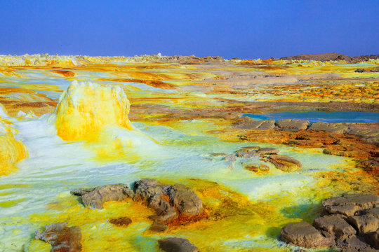 Out-this-planet view to Dallol volcano crater at Danakil Depression and sulfur, salt, potassium, calcium and ferrum mineral fields in hottest place on Earth