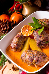 Wintry beef roulades with plum and bacon stuffing and cucumber