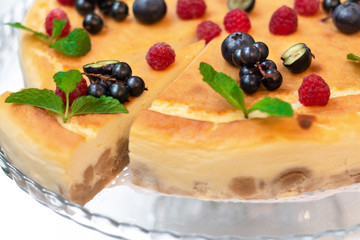 cake with berries and mint close up