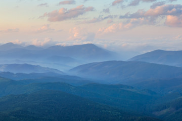 misty mountain valley at the evening