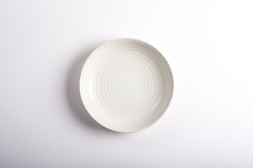 Empty dish isolated on a white background. Top view.