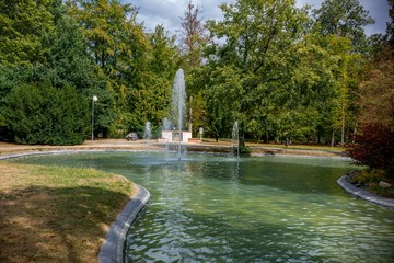 Park with water fountain - center of resort Frantiskovy Lazne (Franzensbad) - great Bohemian spa town is situated north of historical city Cheb in the west part of the Czech Republic