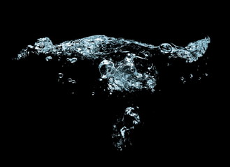 water splash with drops isolated on black background