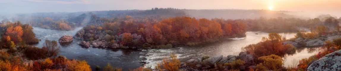 Foto op Canvas amazing panoramic  view of  blue foggy river and colorful forest on sunrise. autumn landscape © ver0nicka