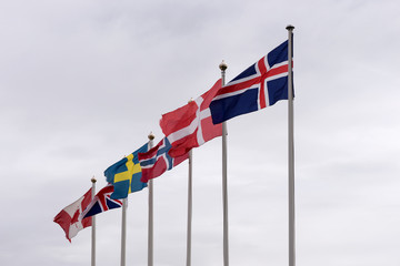 Flags on flagpoles from Iceland, Denmark, Norway, Sweden, United Kingdom and Canada