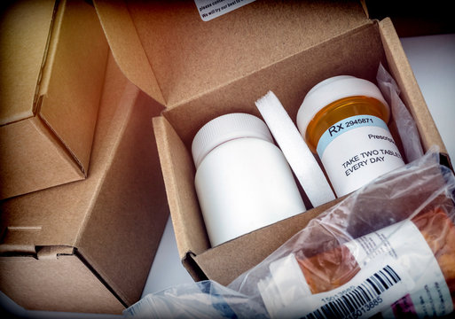 Several boxes of medicines inside prescription medicine, concept image