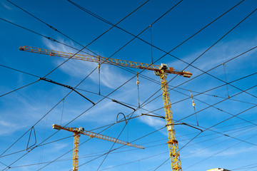  building cranes and tramway power lines