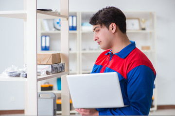 Man working in the postal warehouse