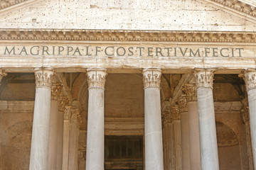 Naklejka premium Entrance portal of the Pantheon in the sunlight. Rome, Italy. 