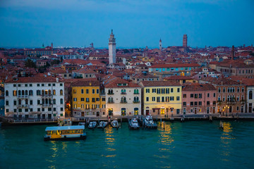Night view of old houses on Grand Canal in Venice in Italy