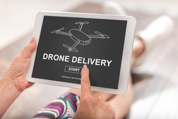Drone delivery concept on a tablet