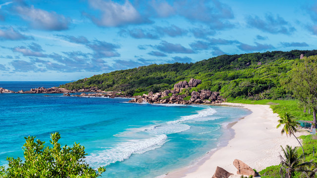 Sea view. Exotic sandy beach with beautiful rocks and turquoise sea in Paradise island. 
