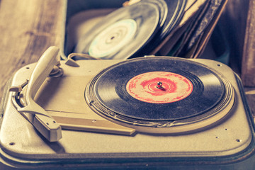 Retro record player and few vinyl records