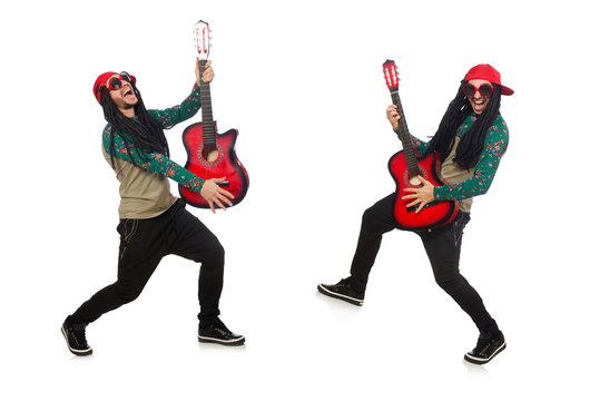 Man with guitar in musical concept on white