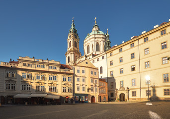 Fototapeta na wymiar St. Nicolas church and and old buildings in central Prague