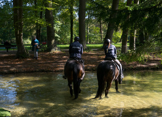 Munich Police on horses in English Garden