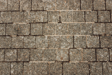 old stone tiles on the pavement