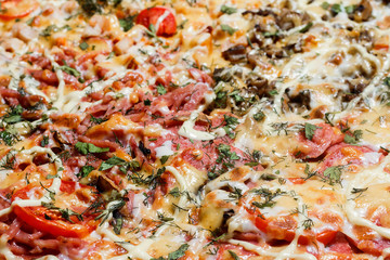 Appetizing background pizza closeup filling the frame