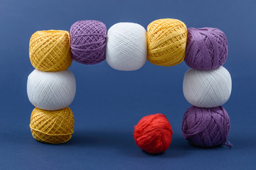 colored balls of thread