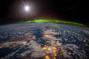  Ireland, United Kingdom and Scandinavia on a moonlit night under an amazing aurora. The elements of this image furnished by NASA. © elen31