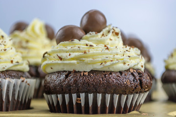 View of white and black cupcakes
